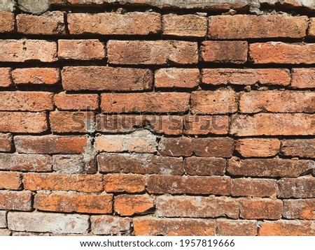 Grunge orange brick wall texture. Orange brick wall wallpaper