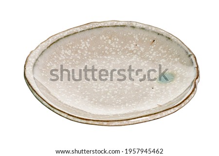 Vintage ceramic plate, Empty ceramic plate, isolated on white background with clipping path, Side view                                 Royalty-Free Stock Photo #1957945462