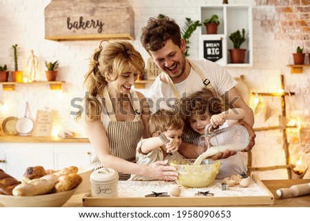 happy family cooking in the kitchen