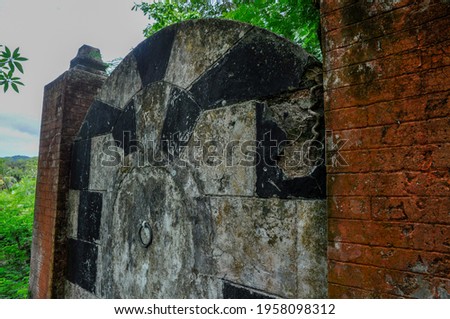 Close-up of the monumental tomb of the wealthy Hossen family, builded in the forest in La Digue Island