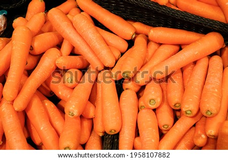 Selling carrots on the counter in the store