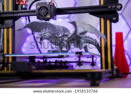 3d print dragon fdm printer with purple background