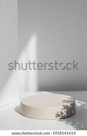 Abstract minimal scene with geometrical form. Cylinder podiums in white colors. Abstract background. Scene to show cosmetic podructs. Showcase, display case. 3d render.