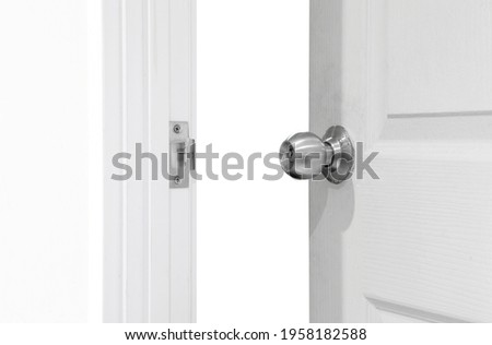 Modern white wooden door open in home