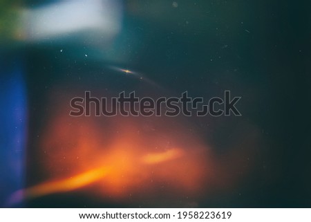 Background of retro film overly, image with scratch, dust and light leaks Royalty-Free Stock Photo #1958223619