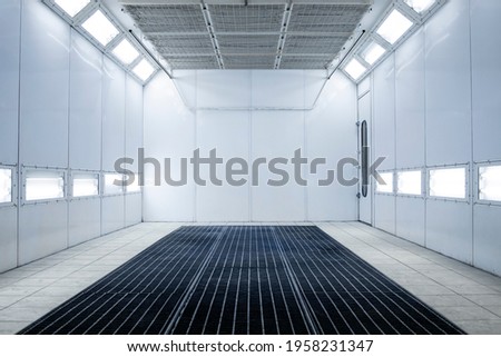 Empty automobile painting chamber or workshop interior. Royalty-Free Stock Photo #1958231347
