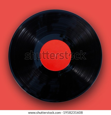 Gramophone vinyl record isolated at the  orange background with clipping path