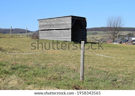little square barn for cattle