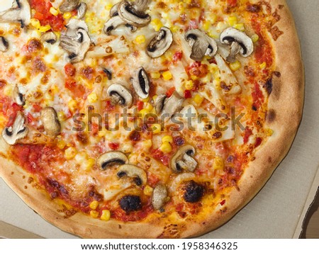 Delicious Whole Pizza with Vegetables Pineapple and Mushrooms Closeup