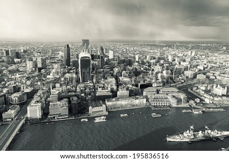 Elevated view of The City of London on a rainy spring afternoon. Retro toned.