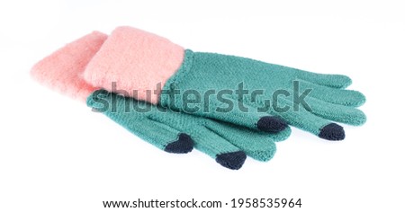 Warm woolen gloves isolated on white background 