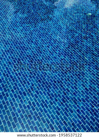 Beautiful swimming pool rippled water detail, abstract pool water pattern texture background