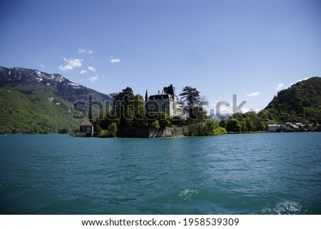Pictures of the lac d'Annecy and the panorama of the Massif Central behind it