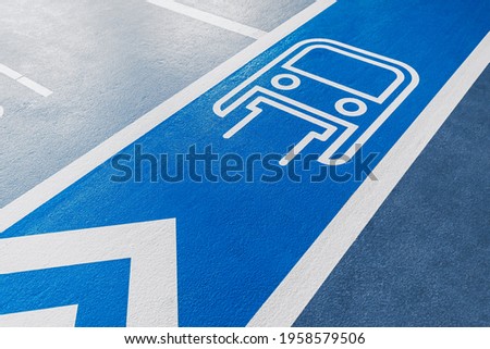 A navigation sign shows the direction to the nearest metro or monorail station on the floor. Public transport in Dubai