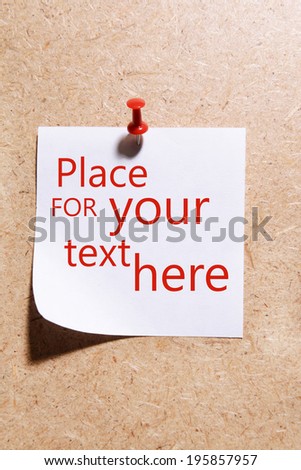 Paper sheet on wooden background