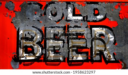 Old worn roadsign cold beer vintage americana on road roadside