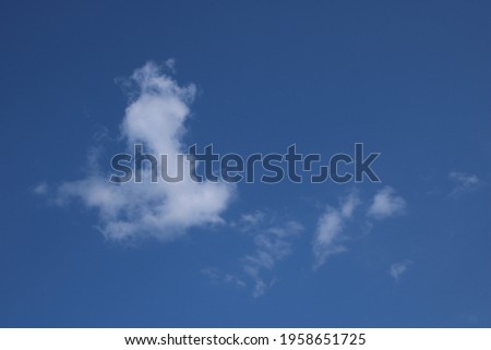 Clouds on a blue background with white clouds.