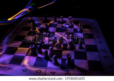 chess board game for ideas and competition and strategy, business success concept. Chess figures on dark. Selective focus