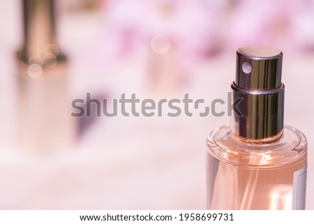 Beauty products on pink marble background