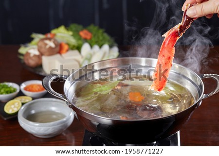 Alaska King crab or Taraba, Kegani, and Zuwai shabu shabu with mushroom and japanese seafood soup dipping and boiling, good for winter