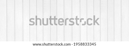 Panorama of New white vintage wooden wall texture and background seamless or a white wooden fence