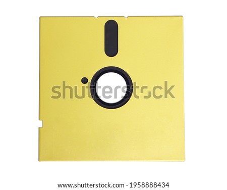Yellow old 5.25 inch diskette that outdated technology isolated on white background.                               