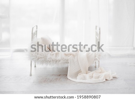 White composite for newborn photosession with bed, fur and pillow. Infant digital background for baby photography. Royalty-Free Stock Photo #1958890807
