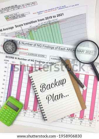 The composition of magnifying glasses, compasses, calculator, the distribution of data on graphs and also notebook wording Backup Plan. Selective focus and little big noise some area. 