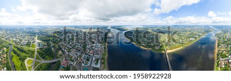 Rybinsk, Russia. View of the embankment of the city of Rybinsk and the bridge over the Volga River. Aerial photography. Panorama 360
