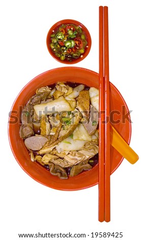 Penang hawker delight Koay Chap (rice noodles in a soup based dish served with duck meat, bean sprouts and egg)