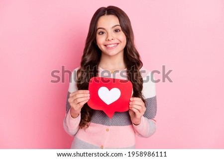 Photo of young cheerful girl happy smile hold reaction icon like share repost follow popular isolated over pastel color background