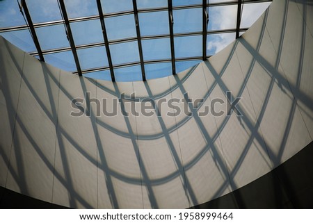 Glass roof skylight window of modern building, abstract architectural background