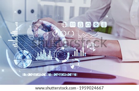 Office woman typing on keyboard of laptop on the table, virtual screen with stock market changes, business bar chart. Double exposure of lines, pie chart and graphs. Concept of financial advisor