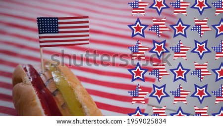 Composition of american flag stars over hot dog with american flag. american patriotism, culture and tradition concept digitally generated image.