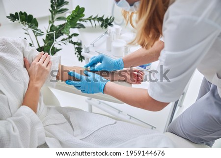 Image of IV infusion in wellness clinic Royalty-Free Stock Photo #1959144676