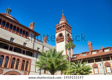 St Augustine Flagler College, Florida. Exterior view with trees and beautiful blue sky.