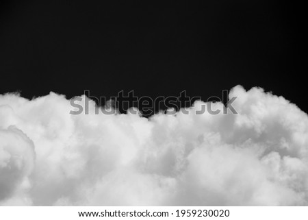 Clouds over black. Abstract dark.