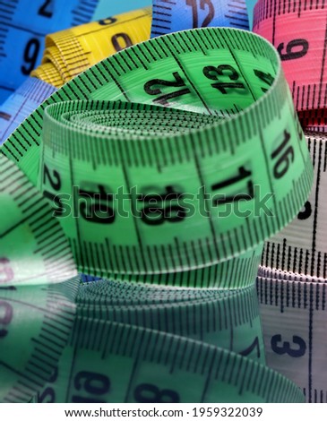 close-up colorful measuring tape on a background