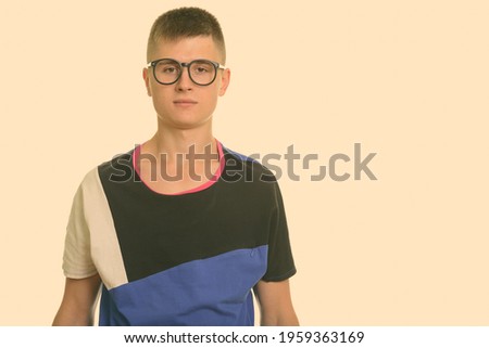 Portrait of young handsome man with eyeglasses