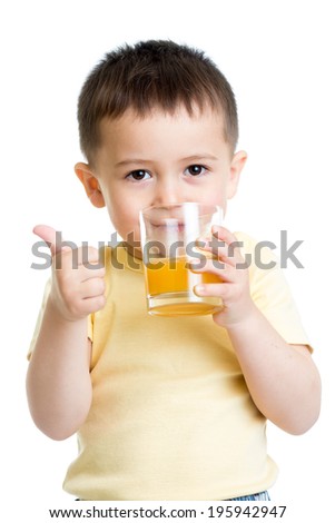 child boy drinking juice  and showing thumb up