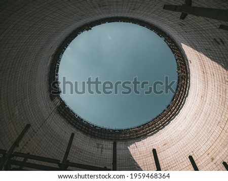 Chernobyl nuclear power plant cooling tower, abandoned city Pripyat, Chernobyl NPP Royalty-Free Stock Photo #1959468364