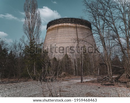 Chernobyl nuclear power plant cooling tower, abandoned city Pripyat, Chernobyl NPP Royalty-Free Stock Photo #1959468463