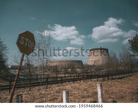 Chernobyl nuclear power plant cooling tower, abandoned city Pripyat, Chernobyl NPP Royalty-Free Stock Photo #1959468466