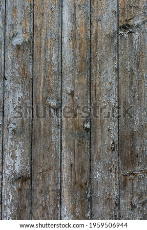An old wooden vintage vertical background in grunge rustic style