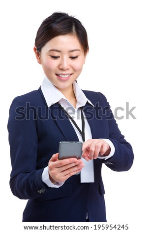 Business woman sending text message