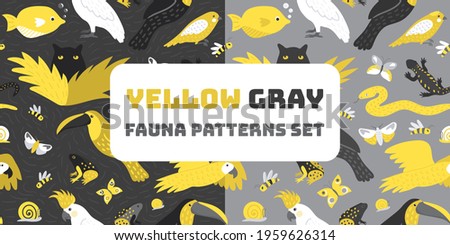 Seamless patterns set with fauna wildlife. Trendy colors of 2021 - gray and yellow. Hand drawn jungle animals - birds, mammals, insects, fish. Modern design for textile.