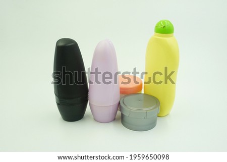 Bottle. Cosmetic bottles differ in color. set of cosmetic products on a white background. Collection of cosmetic packages for creams, shampoos, powders
