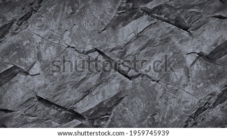 Rock texture. Gray grunge background with copy space for design. Web banner. Mountain texture. Detail.