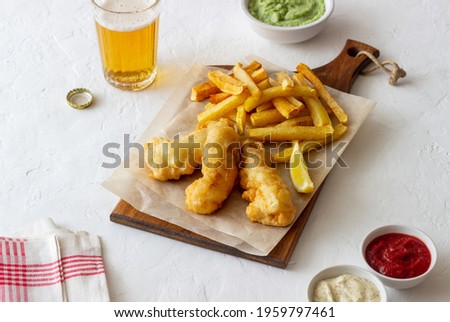Fish and chips on a white background. British fast food. Recipes. Snack to beer. Traditional british food.