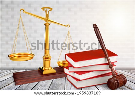 Justice Scales and books and wooden gavel on the table.